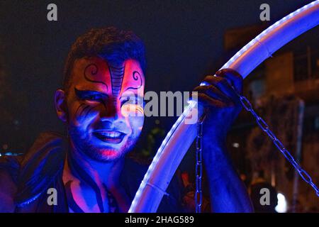 Cultural groups from across Medellin take over the streets for a festive Carnival representing Colombia's myths and legends that opens the Christmas season and Festivities in the City, in Medellin, Colombia on December 8, 2021. Stock Photo