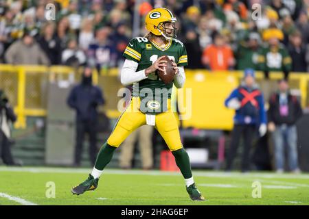 Green Bay, Wisconsin, USA. 12th Dec, 2021. Green Bay Packers quarterback Aaron Rodgers #12 looks to pass the ball during NFL football game between the Chicago Bears and the Green Bay Packers at Lambeau Field in Green Bay, Wisconsin. Packers defeated Bears 45-30. Kirsten Schmitt/CSM/Alamy Live News Stock Photo