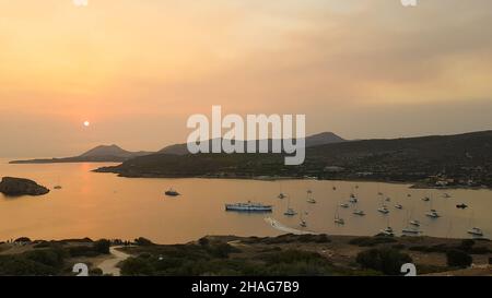 Sunset from temple of Poseidon at Sounio in Greece. A famous touristic destination. Stock Photo