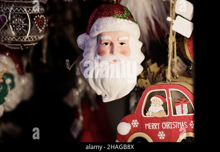 Santa Claus figurine. Santa claus statue with christmas decorations and gifts. Winter holidays concept Stock Photo