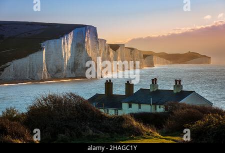 Morning golden hour at the coastguard cottages, Cuckmere Haven, east Sussex, south east England Stock Photo