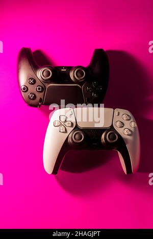 Ukraine - December 10, 2021.Wireless PlayStation 5 Dualsense gamepads. Stock Photo