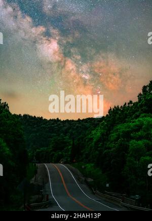 Milky Way rising over Trans-Canada highway in Sault Ste Marie in Ontario. Stock Photo