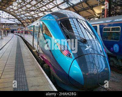 The engine of a TransPennine Express train at Lime Street Station in Liverpool, UK. The train is waiting for passengers to arrive before departing for Stock Photo