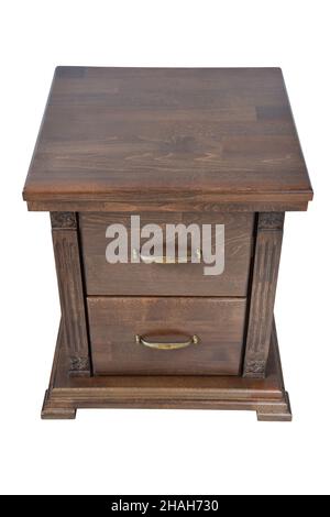 Wooden bedside table for two drawers in brown color with decorative inserts and handles on a white clipping background Stock Photo