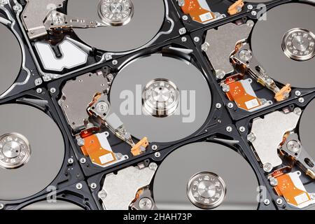 Lots of hard drives in a row, with open covers, close-up Stock Photo