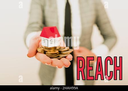 Conceptual display Reach, Word Written on the distance within which something can be touched or grabbed Real Estate Agent Selling New Property, Archit Stock Photo