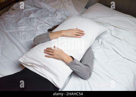 Woman sleeping on the bed Stock Photo