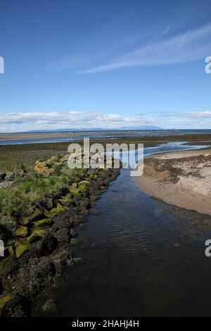 View west from Ayr across the Firth of Clyde towards the Isle of Arran Stock Photo