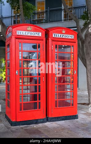 Two red telephone boxes Gibralter Stock Photo