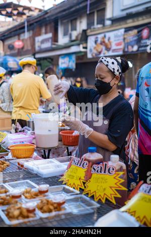 Pattaya Thailand, Naklua night market with lots of street food, local Thai market with people selling food Naklua Night Market. Pattaya Stock Photo