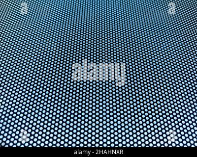 Blurred abstract background perforated pattern with moire effect. Stock Photo