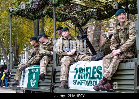 13 November 2021, London, UK - Lord Mayor's Show, 7 Rifles infantry soldiers sitting on a truck, British Army Reserves Stock Photo