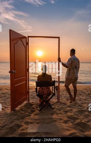 Na Jomtien Beach Pattaya Thailand, white tropical beach during sunset in Pattaya Najomtien. open door to the ocean, couple man and woman on the beach Stock Photo