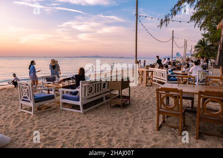 Na Jomtien Beach Pattaya Thailand December 2021, white tropical beach during sunset in Pattaya Najomtien at the Glasshouse famous restaurant Stock Photo