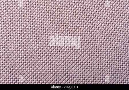 Knitted fabric texture. The pattern is clearly visible. Stock Photo