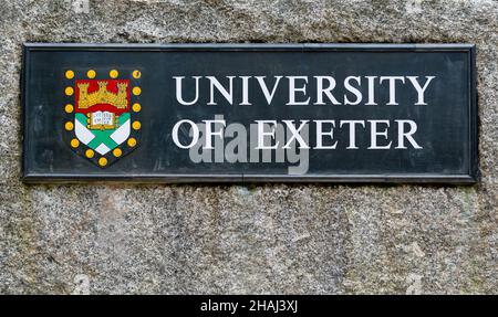 University of Exeter sign and coat of arms (crest) at entrance to Streatham Campus, Exeter Stock Photo