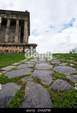 Paving stone coating in perspective. Old Stone Road Stock Photo