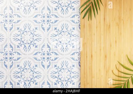 Kitchen background. Empty ceramic tile table with ornament and wooden kitchen board with palm leaves, flat lay. Mock up for display or montage of prod Stock Photo