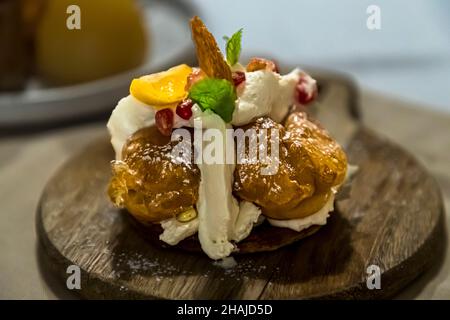 Dish of chef Alexandre Dimtch, Restaurant Saint Marc, Aups, with freshly grated black truffles in Aups, France Stock Photo