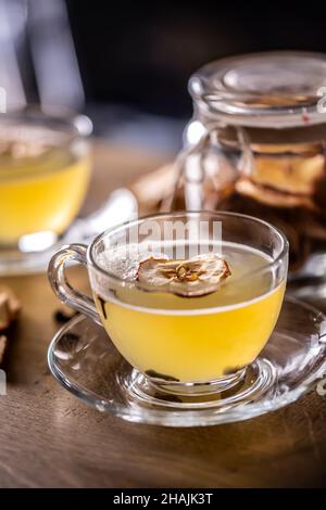 Whiskey drink Hot Apple Teddy with dried apples and cloves. Stock Photo