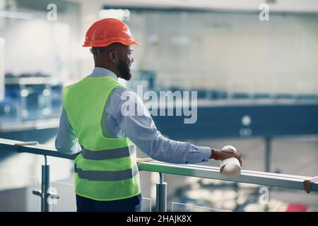 Young back man architect checking construction site Stock Photo
