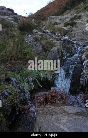 Cascading water over rocks in Carding Mill Valley, Church Stretton, Shropshire Stock Photo