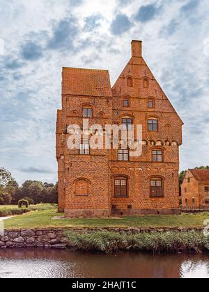 the famous fairytale castle Borreby in the southern island Zealand surrounded by a moat, Denmark, August 10, 2021 Stock Photo