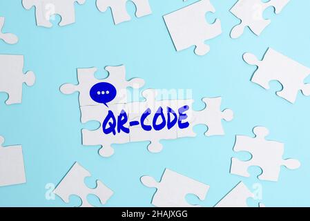 Handwriting text Qr Code. Business overview the trademark for a type of matrix barcode A machinereadable code Building An Unfinished White Jigsaw Stock Photo