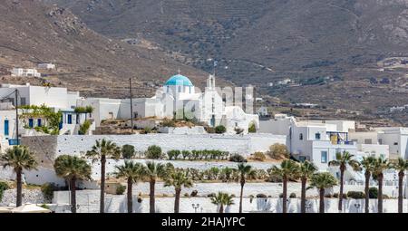 Paros island Cyclades Greece. Frankish Castle Fragiko Kastro and orthodox church in Parikia, whitewashed buildings and palm trees, sunny day. Stock Photo