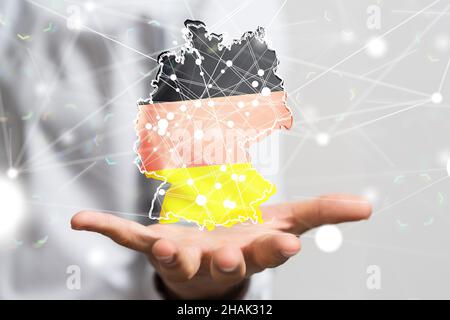 3D rendered German map hovering over a person's hands Stock Photo