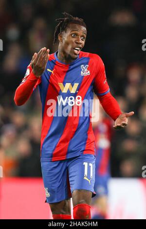 London, UK. 13th Dec, 2021. Wilfried Zaha of Crystal Palace in action during the Premier League match between Crystal Palace and Everton at Selhurst Park, London, England on 12 December 2021. Photo by Ken Sparks. Editorial use only, license required for commercial use. No use in betting, games or a single club/league/player publications. Credit: UK Sports Pics Ltd/Alamy Live News Stock Photo