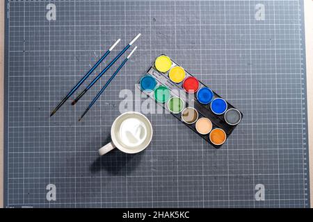Watercolor paint, water and brush are ready Stock Photo