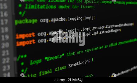 Java Source code of the log4j event logger framework on a screen in close-up with selective focus. The security breach in Log4J / Log4Shell is one of Stock Photo