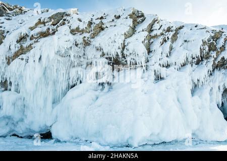 Icy shore of the island on the Lake Baikal in winter. Siberia, Russia. Stock Photo