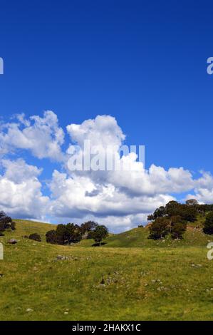 Clouds over a hillside on Coxs River Road Stock Photo