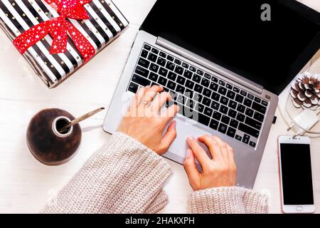 Freelancer works on a laptop in the workplace Stock Photo