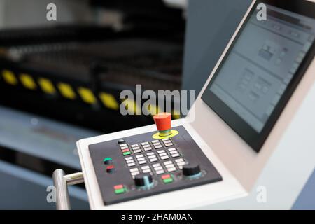 CNC control panel of laser metal cutting machine. Selective focus. Stock Photo