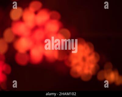 Deliberately out of focus background image of red lights Stock Photo