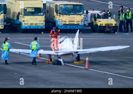 Taipei, Taipei, Taiwan. 14th Dec, 2021. The 19-year-old British-Belgian pilot Zara Rutherford steps out of the aircraft after touching down at Song Shan International Airport in Taiwan. Zara Rutherford attempts to become the youngest woman to fly solo around the world and be the first Belgian and the first woman to circumnavigate the world in a single engine aircraft by traveling to 52 countries across 5 continents, including the US, UK, South Korea, India and Taiwan, in order to break the Guinness World Records. (Credit Image: © Daniel Ceng Shou-Yi/ZUMA Press Wire) Stock Photo