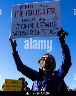 December 13, 2021, Washington, District of Columbia, USA: A participant at the Poor PeopleÃs Campaign rally held a sign demanding Congress end the filibuster and pass the John Lewis Voting Rights Act. (Credit Image: © Sue Dorfman/ZUMA Press Wire) Stock Photo