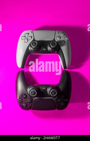 Ukraine - December 10, 2021.Wireless PlayStation 5 Dualsense gamepads. Stock Photo