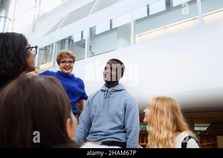 Group of students in library Stock Photo