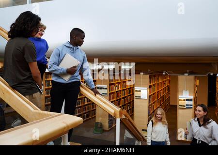 Group of students in library Stock Photo