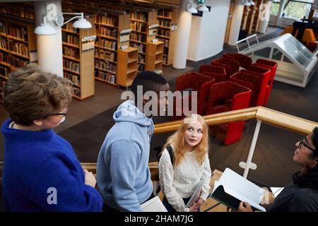 Group of students in library Stock Photo