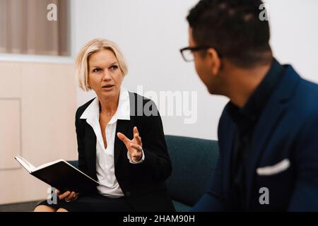 Coworkers having meeting Stock Photo