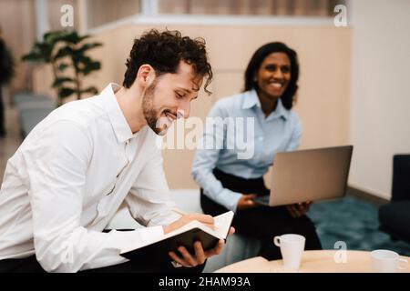 Coworkers having meeting Stock Photo