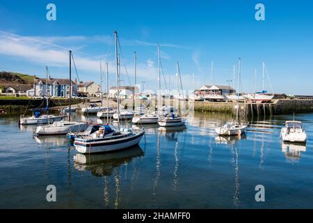 Afon Aeron River estuary with boats moored in harbour at high tide in attractive seaside town. Aberaeron, Ceredigion, Wales, UK, Britain Stock Photo