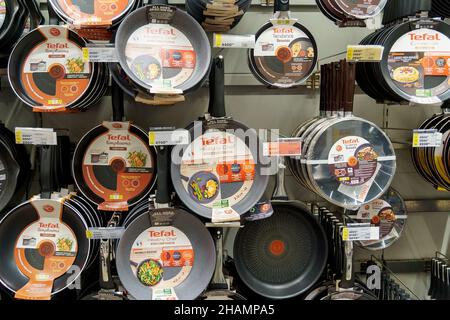 Tyumen, Russia-December 02, 2021: Tefal frying pan display in a large hypermarket. Sale of kitchen utensils Stock Photo