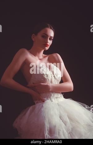 Portrait of an elegant refined ballet woman dancer posing in studio. Stock Photo